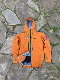 Image of rust shell jacket 