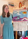 Little blue house in the Candy Mountains. Woven wall hanging.