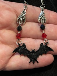 Bat necklaces