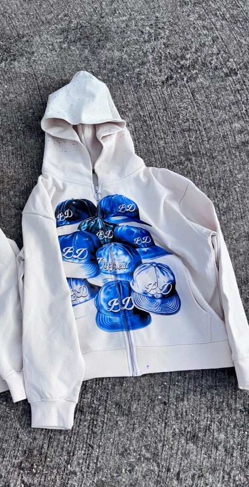 Image of Caps Crème Zip Up
