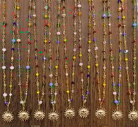 Image 1 of sun chakra necklaces