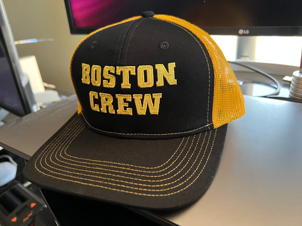 Black and Gold Trucker Snapback Cap with Boston Crew logo