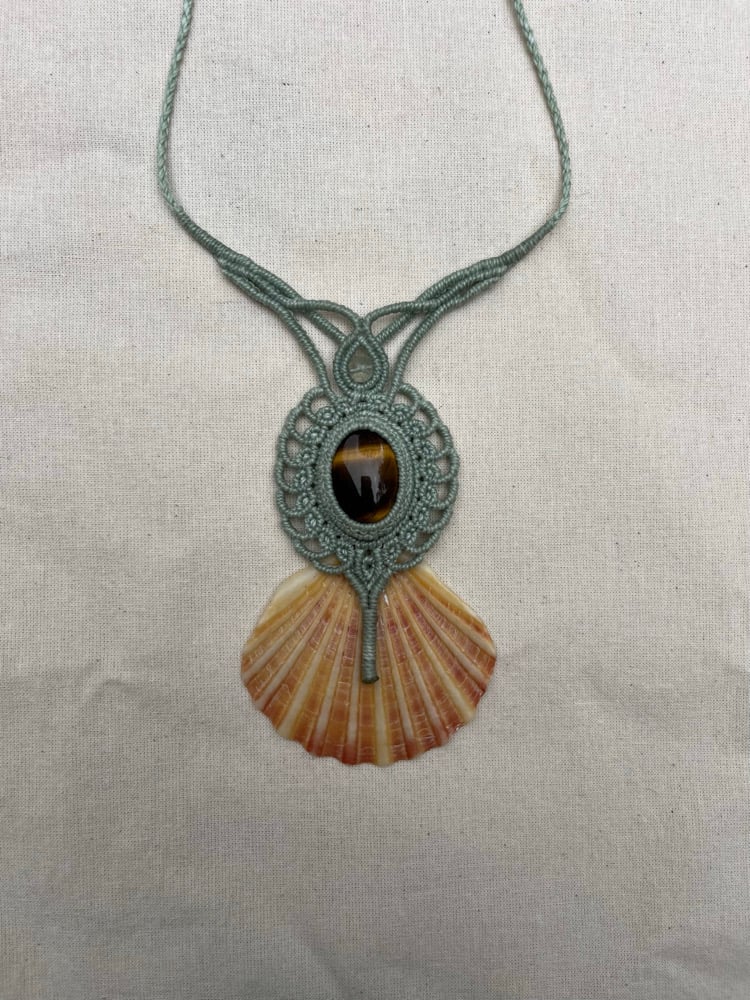 Image of macrame necklace with tigers eye and shell