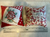 Red w/red rose and small blue beads