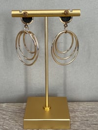 Image 2 of Triple circle black and gold tone drop earrings 