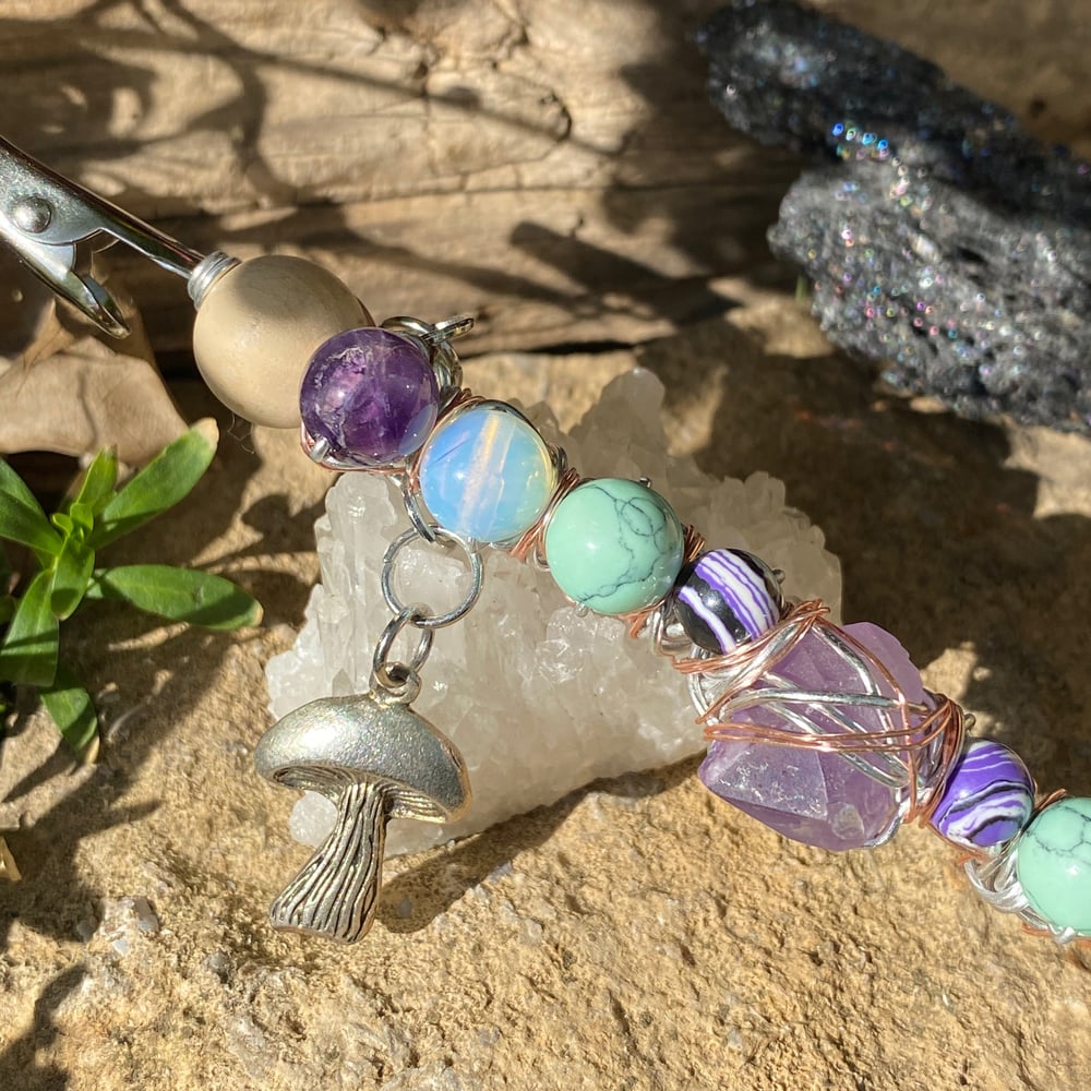 Image of lilac sea foam roach clips