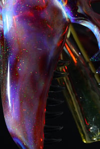Image 4 of Opalized amber purple T-Rex skull pendant with illuminati joint tip