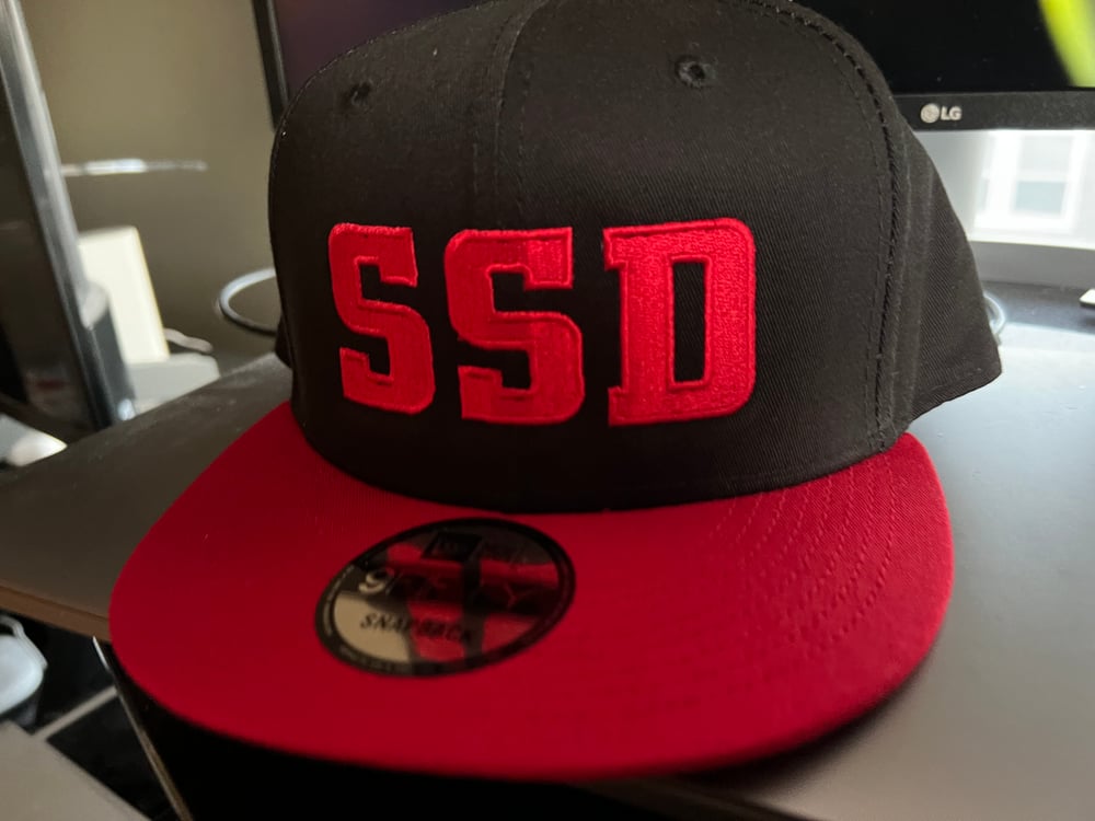 Black & Red New Era Flat Bill SnapBack Solid Red SSD Logo hat