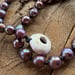 Image of Hand knotted Edison pearl necklace with purple puka shell clasp 19 inch