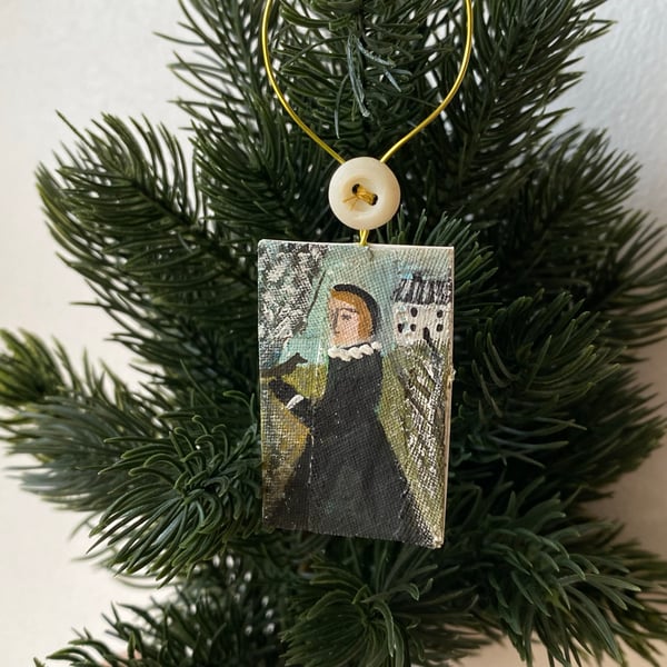 Image of Winter portrait with bird in hand