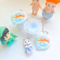 Image 2 of ocean & clover pudding ₊˚♪ 𝄞  squishy jelly keychains!! 🐟☘️