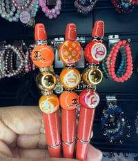 Image 1 of Orange designer pens