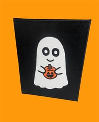 Ghost holding pumpkin