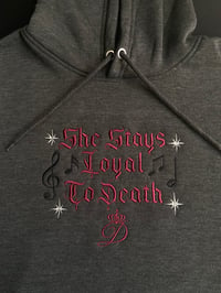 Image 3 of “She Stays Loyal To Death” Hoodie with stars & music notes embroidered (on center of chest)