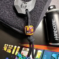 Image 1 of “LOCO” graffiti bead