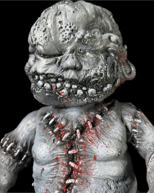 Image of Grayscale & blood Autopsy Baby (in jar)