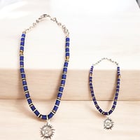 antiposession beaded necklace