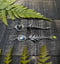 Image of Lady Fern Mismatch Giraffe Turquoise Eye-Clear Moonstone Peridot Dangle Earrings