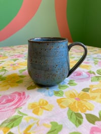 Image 1 of blue speckled teacup