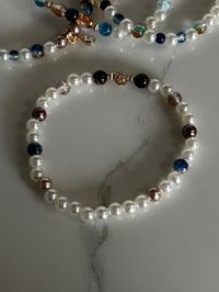 Image 8 of Starlight Shimmer Moon and Stars| Cream, Navy, and Gold  Tumbler Bracelet Stack