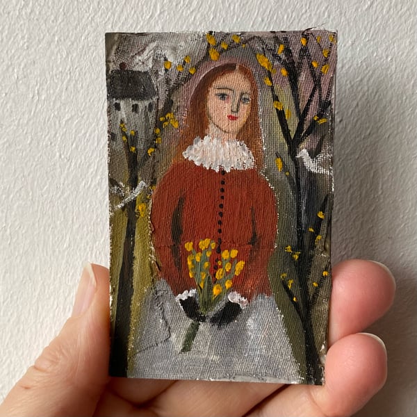 Image of Autumnal walk - woman in red and grey - tiny portrait 