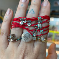 Image 2 of Zodiac signs bracelet