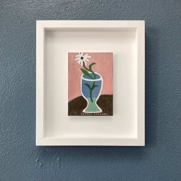 Image of Daisy in a Wine Glass
