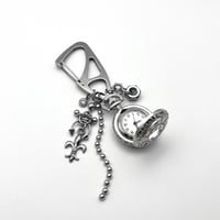Image 2 of #PASSAGE_OF_TIME KEYCHAIN 03