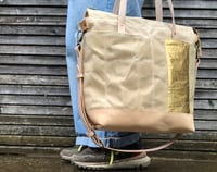 Image 1 of Diaper bag / Large tote bag in waxed canvas and leather with cross body strap COLLECTION UNISEX
