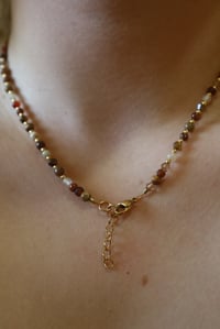 Image 2 of Brown Swirl (gold spacers)