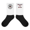 Tube socks with an ATA logo and the created to create slogan