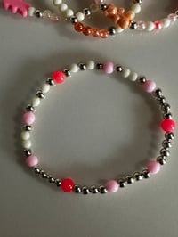 Image 7 of Pastel Gummy Bear Tumbler Bracelet Stack | Peach & Pink Cup Accessory