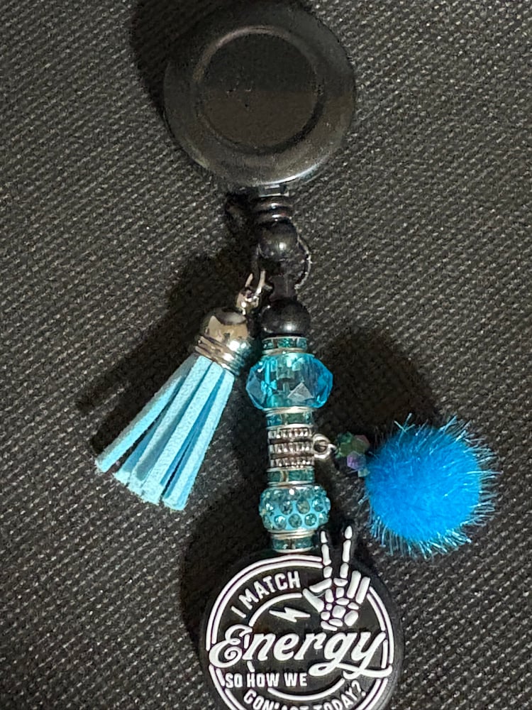 Image of Black and Blue I match energy  Badge Reel with Tassel