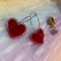 Image 1 of Red resin hearts 