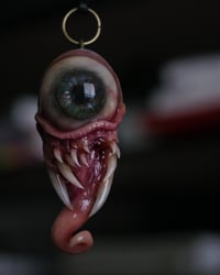 Image 1 of Twisted tongue pendant, OOAK Blue Green Glow