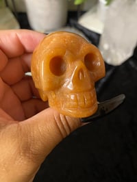 Image 2 of Orange Calcite Skull