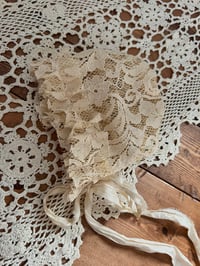 Image 4 of Antique Beige Lace Newborn Bonnet Silk Tie