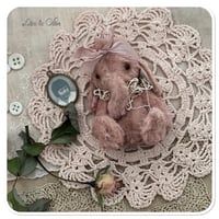 Image 1 of Handmade pink elephant wearing a vintage french lace collar