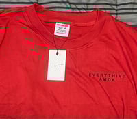 EVERYTHING AMOR red an black shirt 