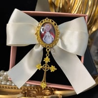 Image 2 of Ivory Daughter of a King Bow Clip - Silver Charm