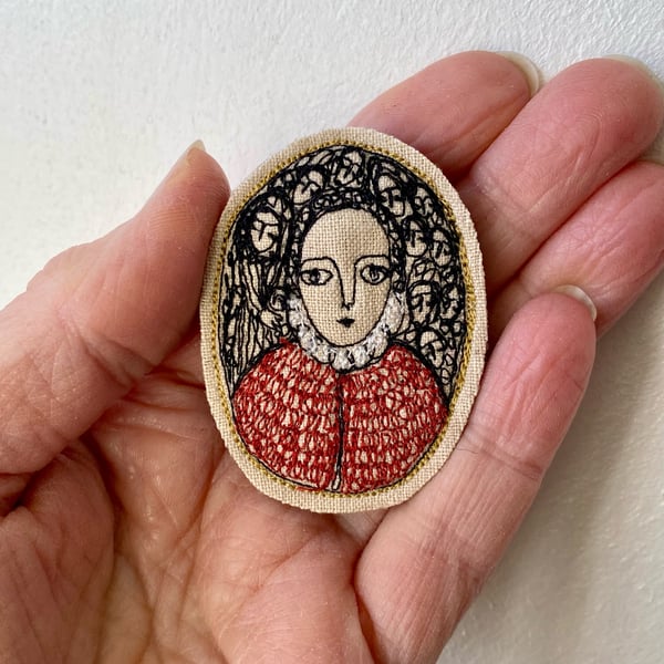 Image of Woman with knitted cape - smaller embroidery portrait brooch