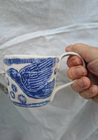 Image 1 of Flying Cat and Bird mug