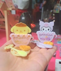 Romi and Purin Resin Standees