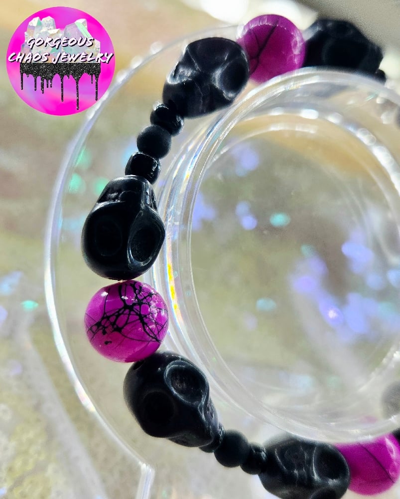 Image of Neon Purple with Black Skulls
