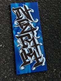 stacked bevelled letters. Blue, white, brown 