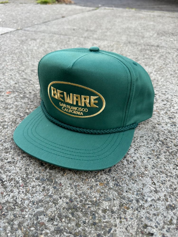 Image of beware old logo green 