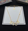 D* gold plated necklace 