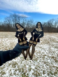 “Flashin’ Nun”