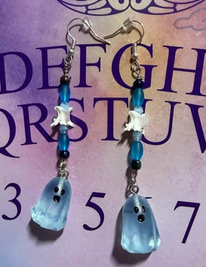 Image of Snake Vertebrae Glow in the Dark Ghost Earrings