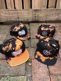 Image 1 of Bleached caps 